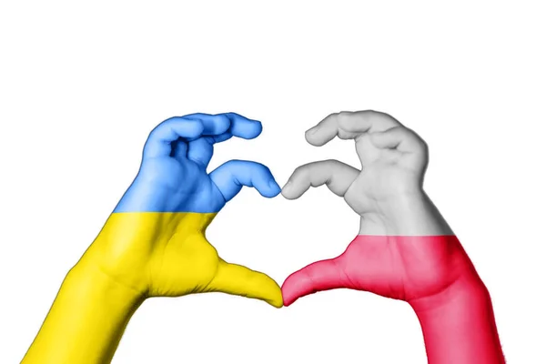 001c154-depositphotos-550613524-stock-photo-poland-ukraine-heart-hand-gesture
